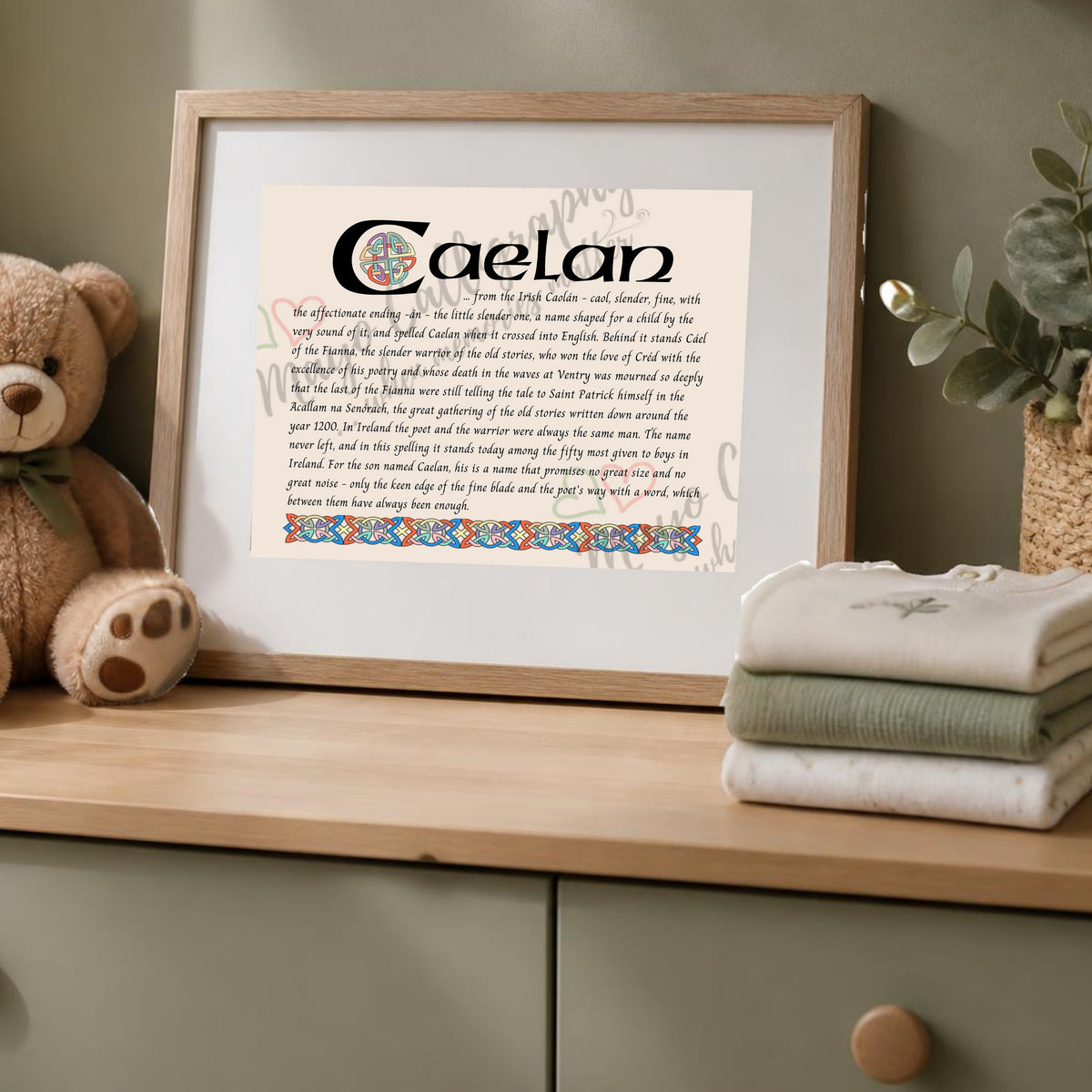 Caelan Celtic name print in a wooden frame on a dresser with a teddy bear