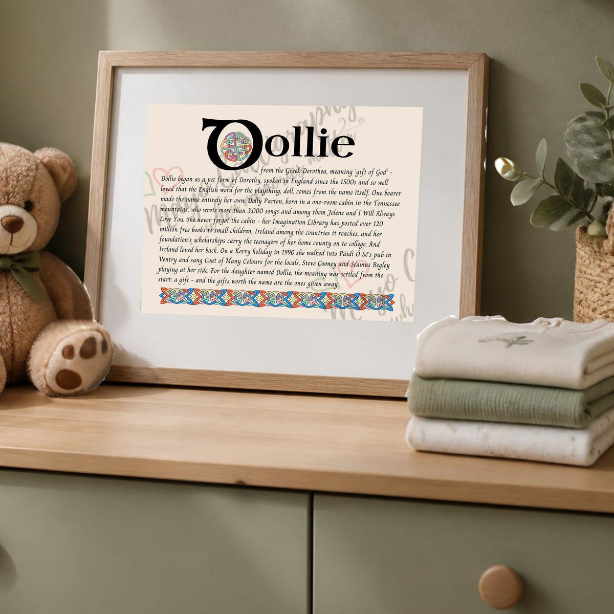 Dollie Celtic name print in a wooden frame on a dresser with a teddy bear