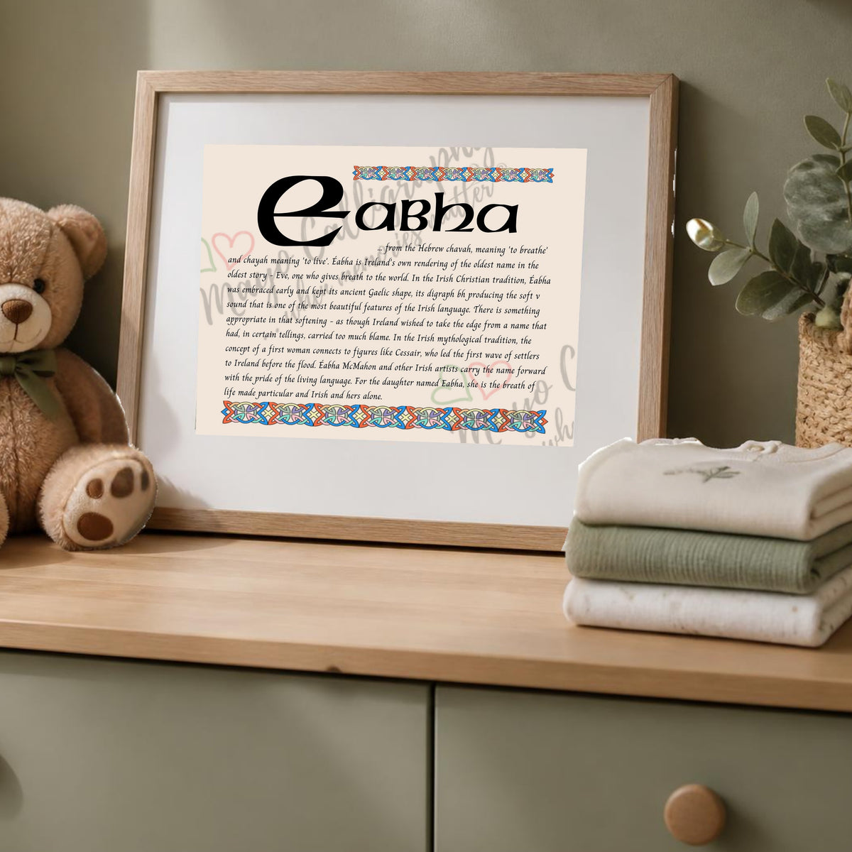 Eabha Celtic name print in a wooden frame on a dresser with a teddy bear