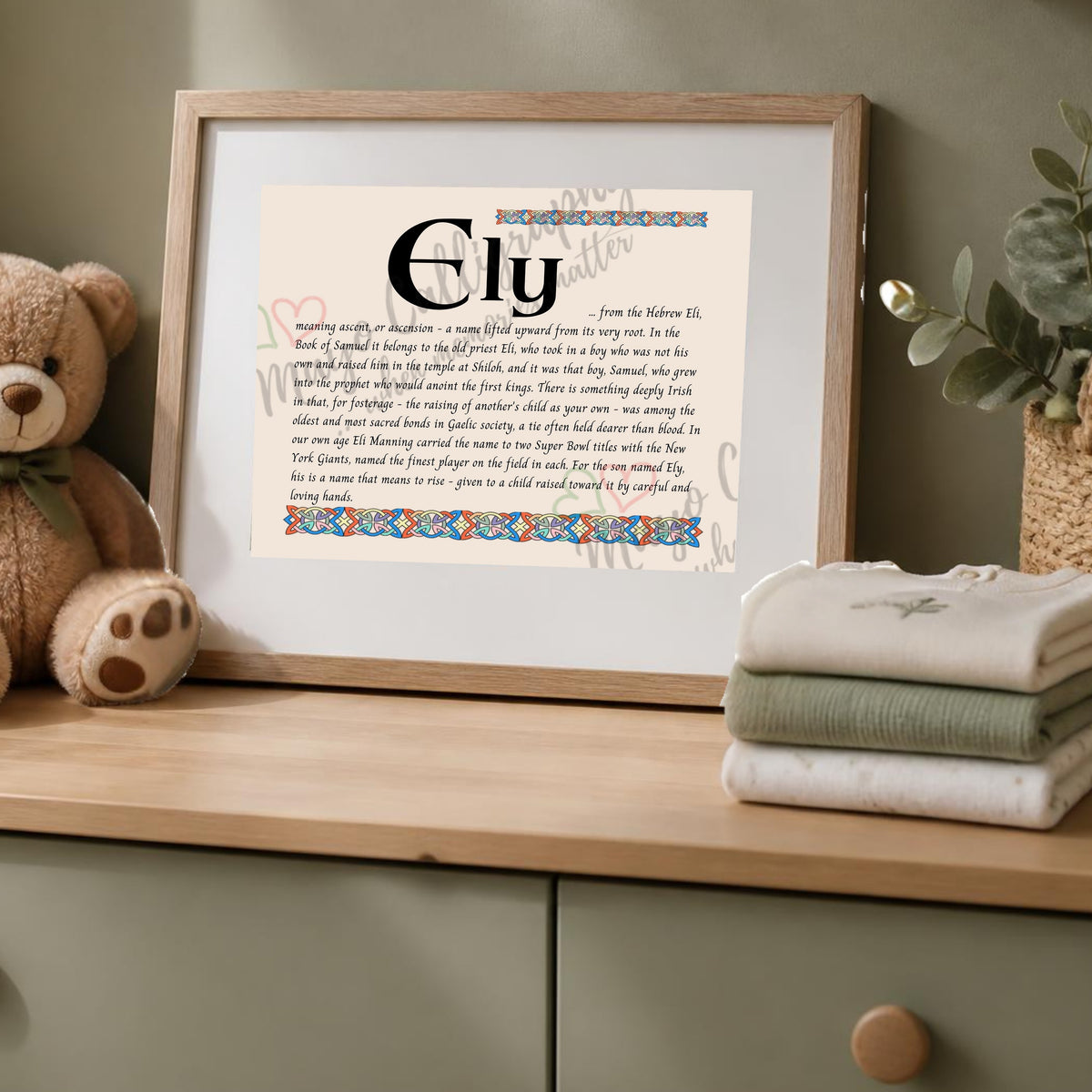 Ely Celtic name print in a wooden frame on a dresser with a teddy bear