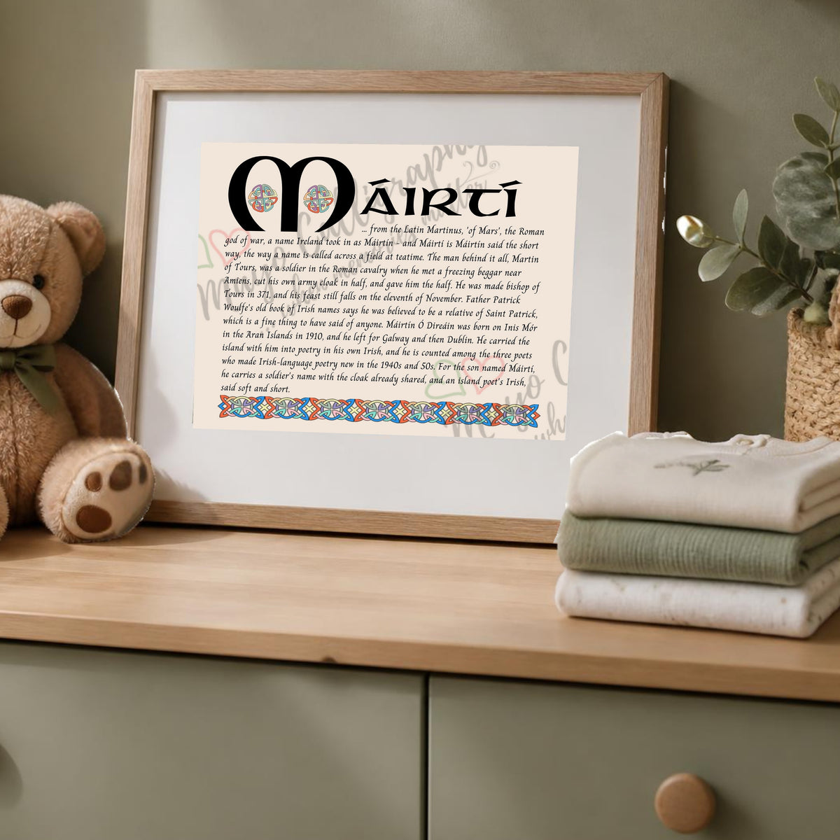 Máirtí Celtic name print in a wooden frame on a dresser with a teddy bear