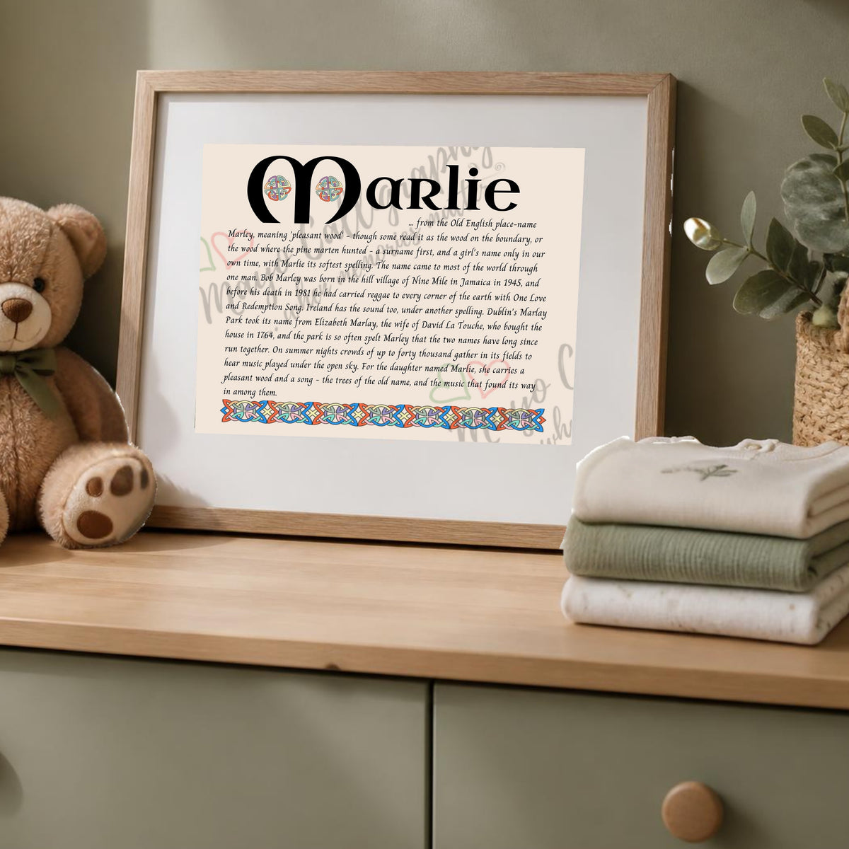 Marlie Celtic name print in a wooden frame on a dresser with a teddy bear