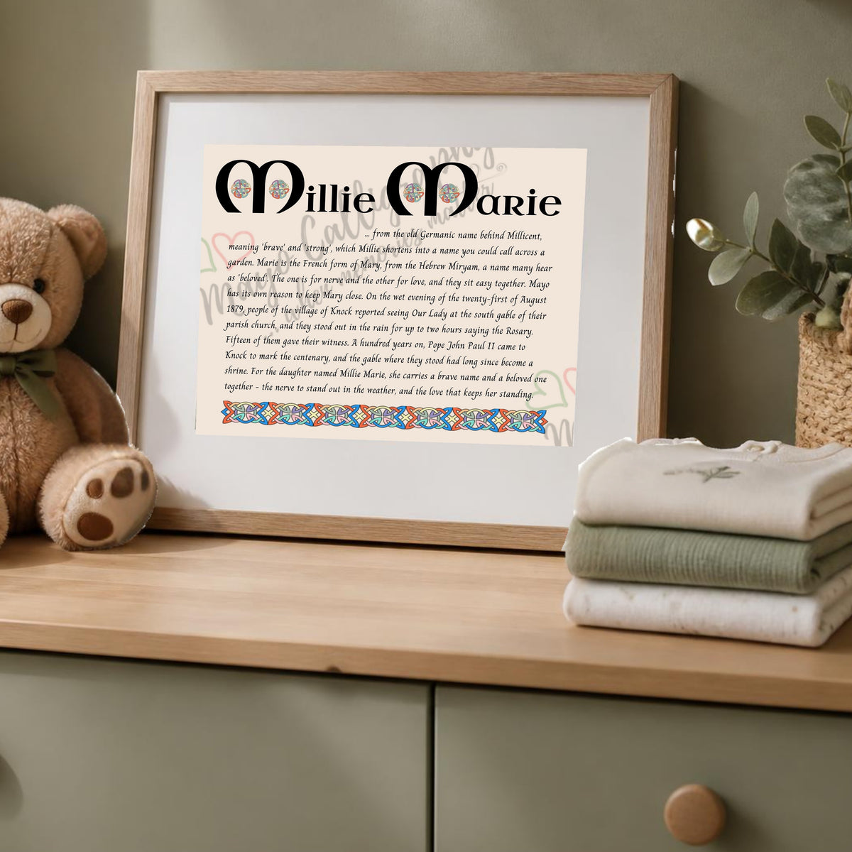 Millie Marie Celtic name print in a wooden frame on a dresser with a teddy bear