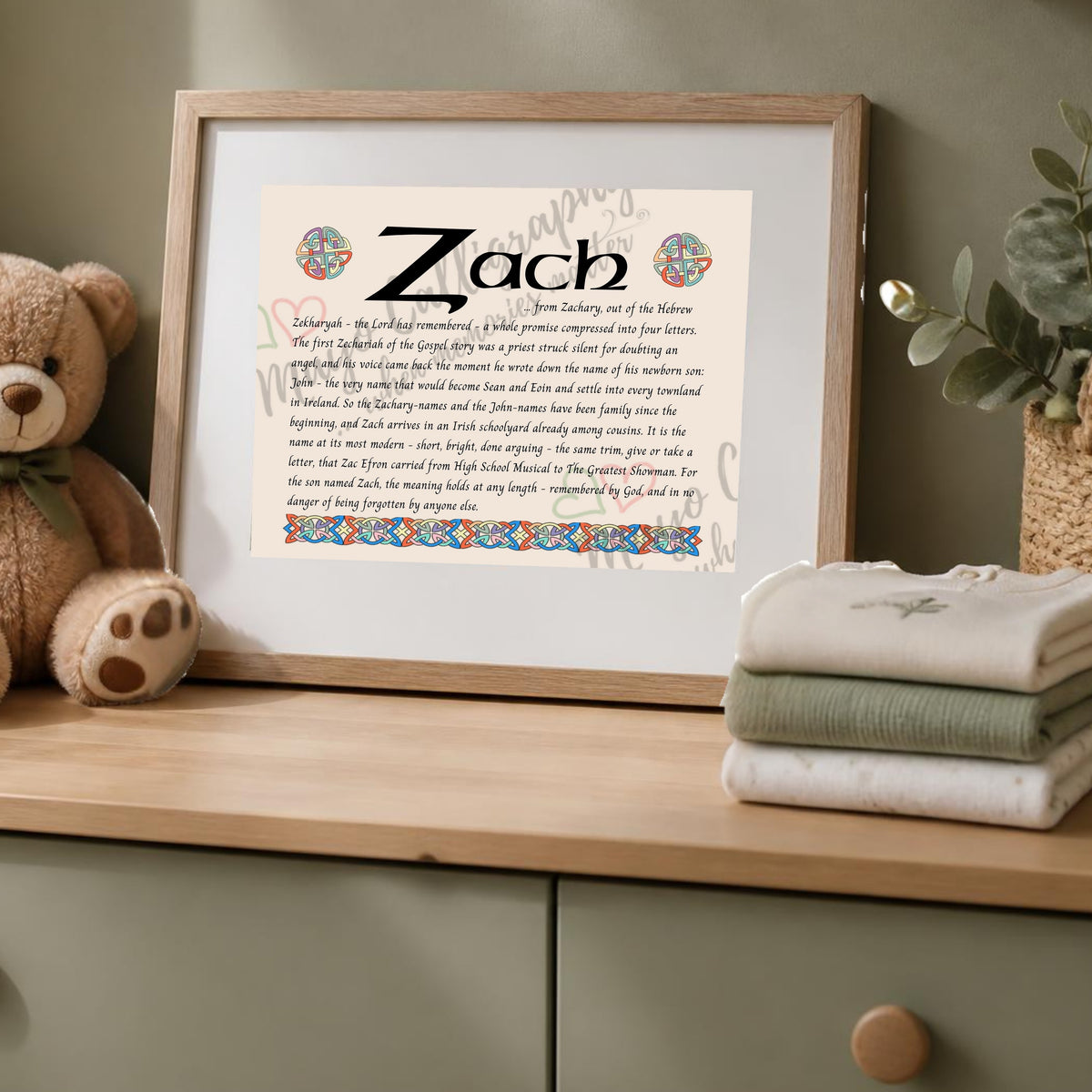 Zach Celtic name print in a wooden frame on a dresser with a teddy bear
